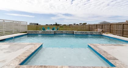 BRAND NEW 4/3.5 w/ heated pool and water views. Kid friendly and close to golf