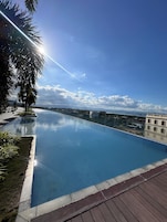 Outdoor pool, open 8:00 AM to 10:00 PM, lifeguards on site