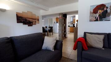 Smart TV, DVD player, foosball, books