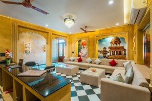 Quarto casal luxo | Área de estar