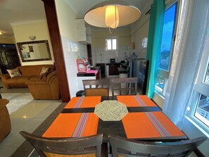 Elite Apartment | Living area | 24-inch Smart TV with digital channels - Lux Suites La Vida Sunrise Apartments (Mombasa)