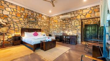 Premium bedding, desk, laptop workspace, blackout drapes