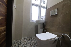 Deluxe Double Room | Bathroom | Bathtub, free toiletries, children's dressing gowns, towels - Twamev Rajouri garden by The Arrow (New Delhi)