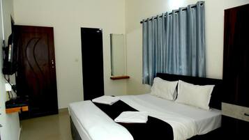 Habitación Deluxe | Caja de seguridad en la habitación y decoración personalizada