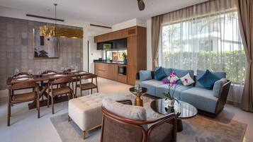 Two Bedroom Garden View Pool Villa | Living area | 55-inch Smart TV with digital channels