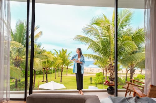 Three Bedroom Beachfront Pool Villa | Minibar, in-room safe, desk, laptop workspace