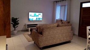 Superior Apartment | Living area | 24-inch Smart TV with digital channels - Pontoon Residence & Suites (Mombasa)