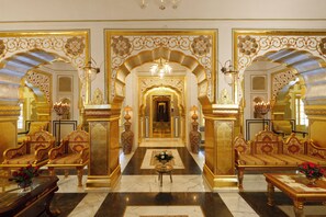 Presidential Villa | Living area | 52-inch LED TV with digital channels, DVD player, toys - The Raj Palace (Jaipur)