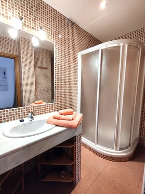 Hair dryer, towels, soap, shampoo