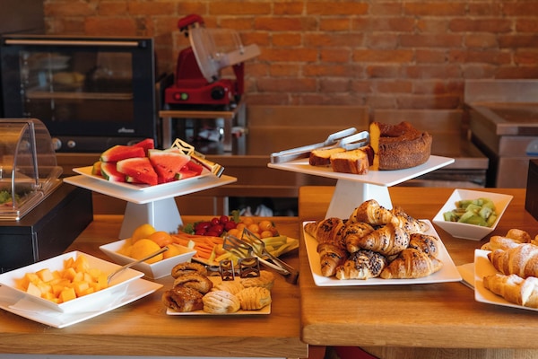 Daily buffet breakfast for a fee