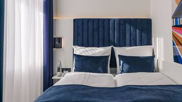 Quarto casal superior | Escrivaninha, Wi-Fi de cortesia, roupa de cama