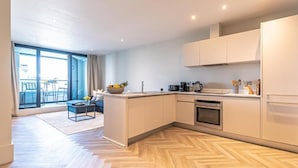 City Apartment, 1 Bedroom, Balcony, River View | Private kitchen | Fridge, microwave, oven, stovetop - NOVU Apartments Liverpool Waterfront (Liverpool)
