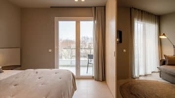 Apartamento estándar, 1 cama de matrimonio grande con sofá cama | 1 dormitorio, caja fuerte, cortinas opacas y sistema de insonorización