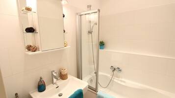 Hair dryer, towels, soap, toilet paper