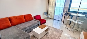 Apartamento, 1 quarto, para fumantes, sacada | Área de estar