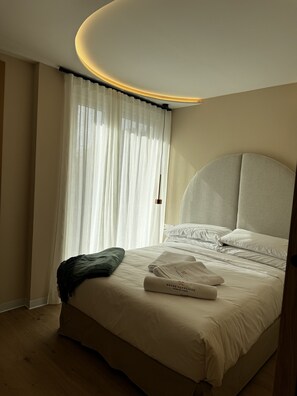 1 dormitorio, tabla de planchar con plancha, cuna de viaje y wifi gratis