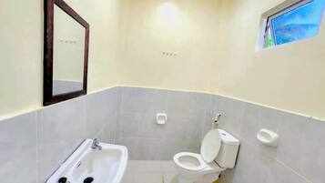 Shower, towels, soap, shampoo