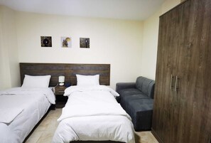 1 chambre, fer et planche à repasser, Wi-Fi gratuit, draps fournis