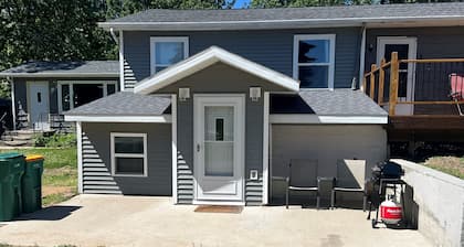 Located across the road of West Lake Okoboji. 8 beds. Room for parking trailers