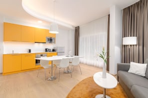 One - Bedroom Panorama Suite | Private kitchen | Fridge, stovetop, espresso maker, electric kettle - Limehome Graz - Argos by Zaha Hadid (Graz)
