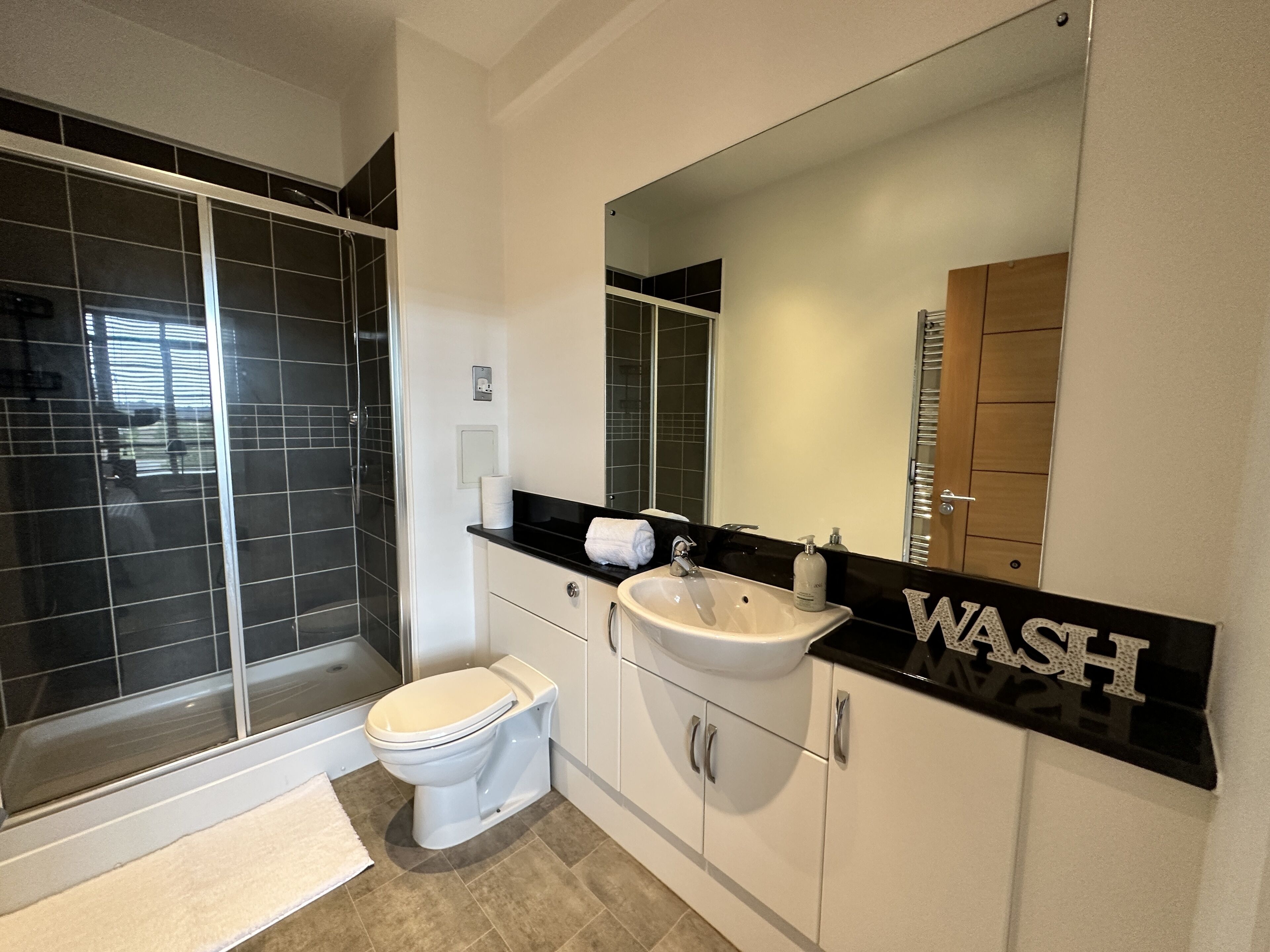 Hair dryer, towels, soap, toilet paper