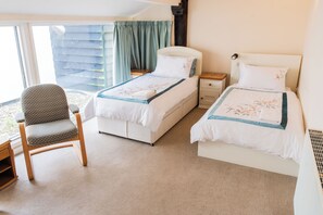 2 dormitorios, tabla de planchar con plancha, wifi y ropa de cama