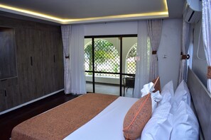 Premium bedding, memory-foam beds, desk, laptop workspace - Makaazi (Mombasa)