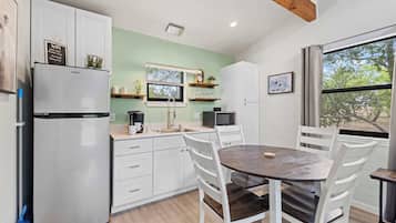 Cottage, 1 King Bed with Sofa bed, Hot Tub, River View | Private kitchen | Coffee/tea maker