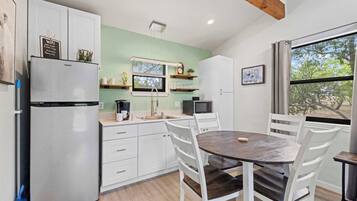 Cottage, 1 King Bed with Sofa bed, Hot Tub, River View | Private kitchen | Coffee/tea maker