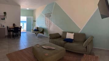 CLin 101 Casita Linda - 1 King / 1 Futon 1st Floor | Living area | Flat-screen TV
