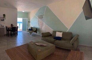 CLin 101 Casita Linda - 1 King / 1 Futon 1st Floor | Living area | Flat-screen TV