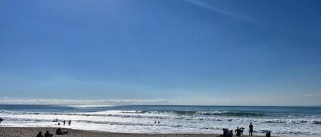 On the beach, sun loungers