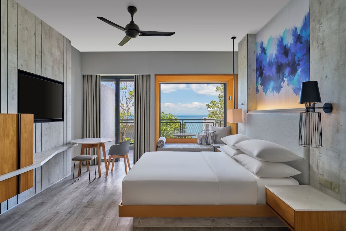 Deluxe Room, 1 King Bed, Partial Sea View | Premium bedding, minibar, in-room safe, desk