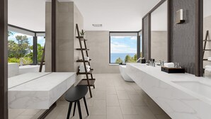 Ein modernes Badezimmer mit zwei großen Waschbecken, einer Wendeltreppe als Regal und Blick ins Freie.