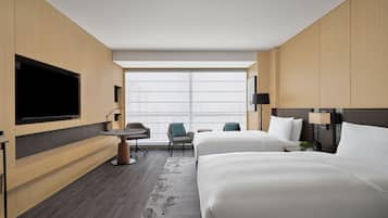Executive Twin Room | 1 dormitorio, minibar, caja fuerte y escritorio