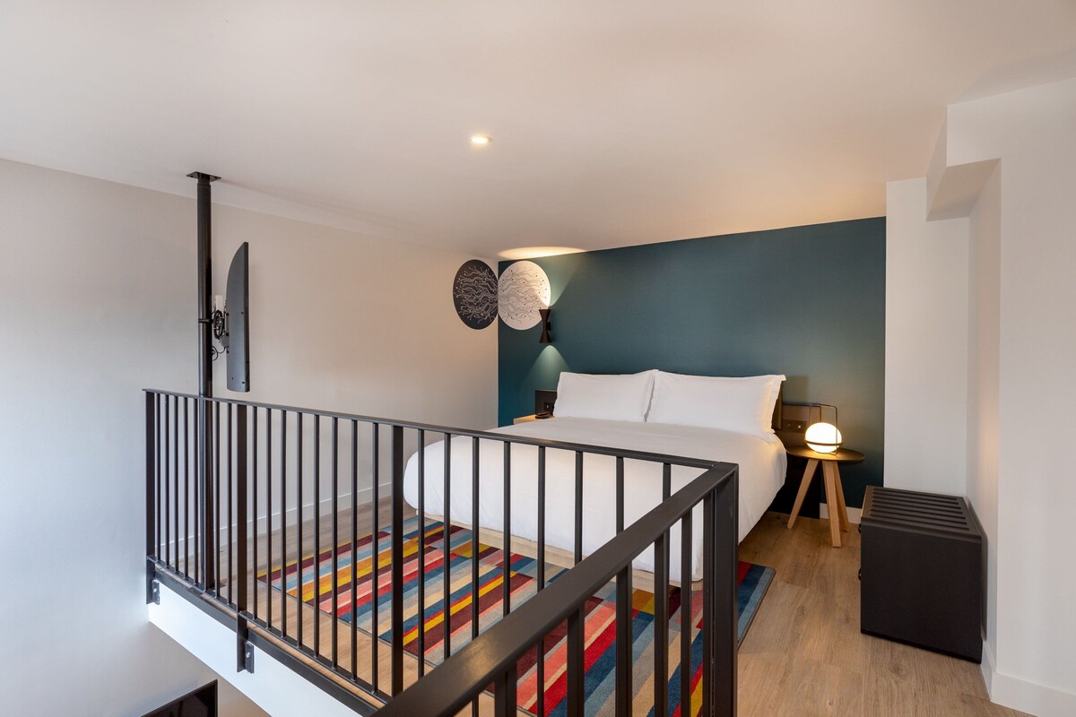Duplex, 1 King Bed with Sofa bed, City View | Premium bedding, minibar, in-room safe, desk