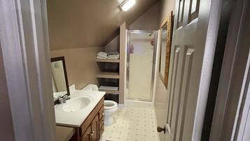 Shower, towels, soap, shampoo
