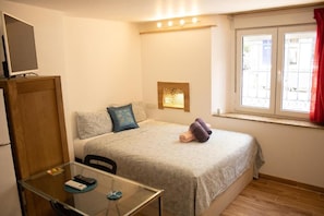 1 bedroom, desk, blackout drapes, iron/ironing board