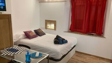 City Apartment | 1 bedroom, desk, blackout drapes, iron/ironing board