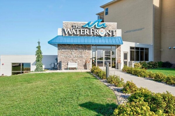 A building with a sign reading "The Waterfront" and "American Grille & Winter Center".