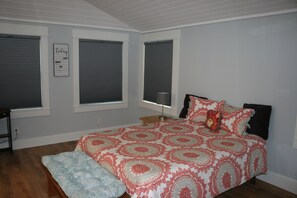 1 bedroom, desk, iron/ironing board, travel crib