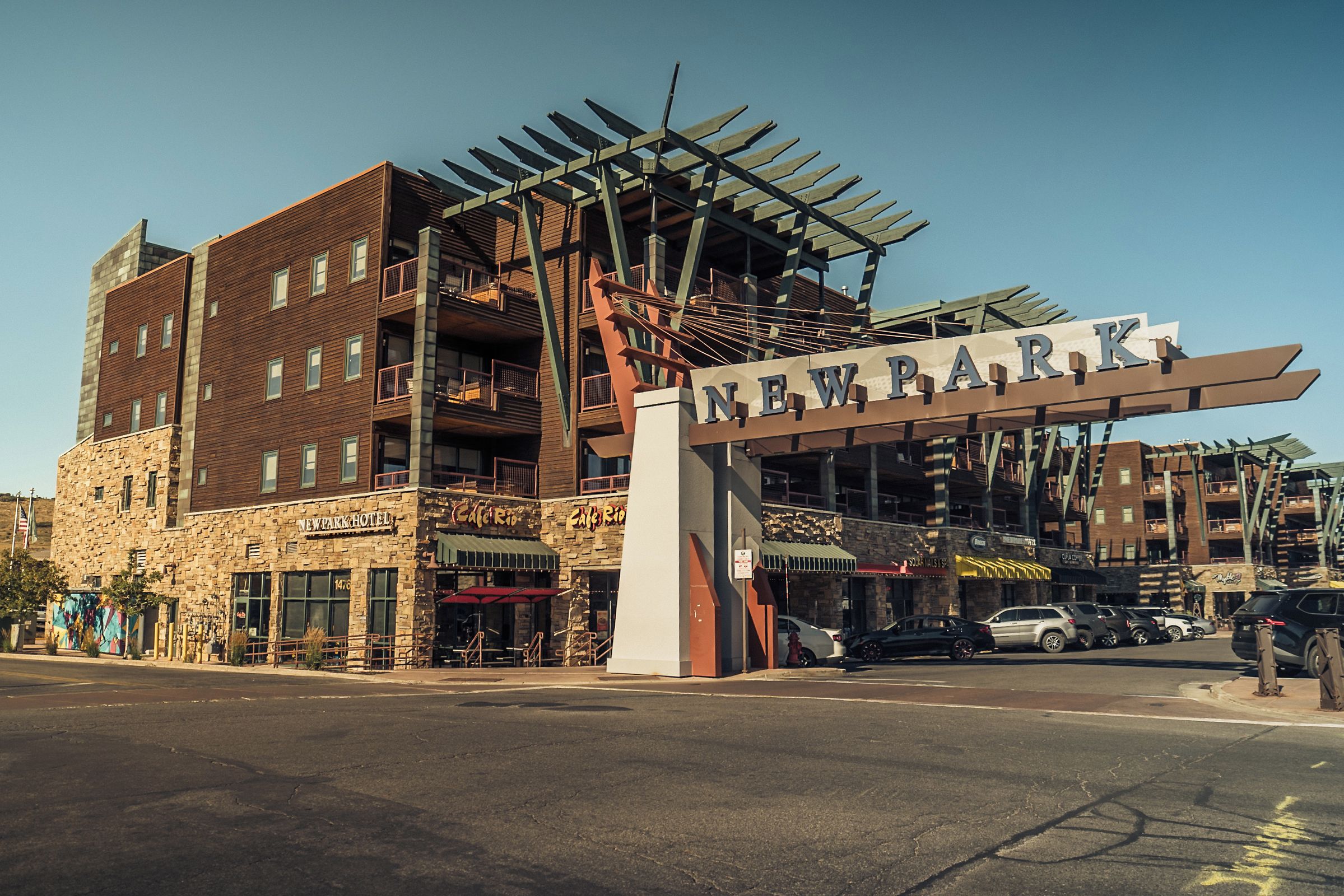 A multi-story building with a prominent 'NEWARK' sign at the entrance.