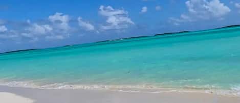 On the beach, sun-loungers, beach towels