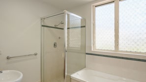 Shower, hair dryer, towels