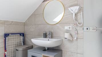 Shower, hair dryer, shampoo