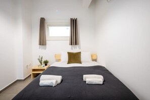 2 slaapkamers, een strijkplank/strijkijzer