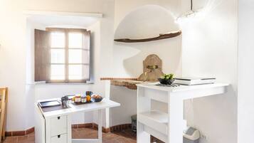 Fridge, microwave, stovetop, cookware/dishes/utensils