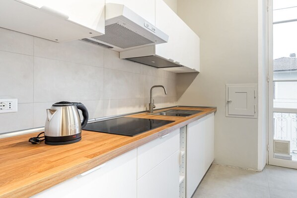 Fridge, stovetop, cookware/dishes/utensils