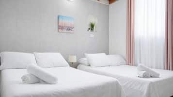 Basic Room | Individually furnished, desk, laptop workspace, bed sheets