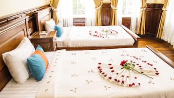 Family Suite, City View | Desk, free WiFi, bed sheets